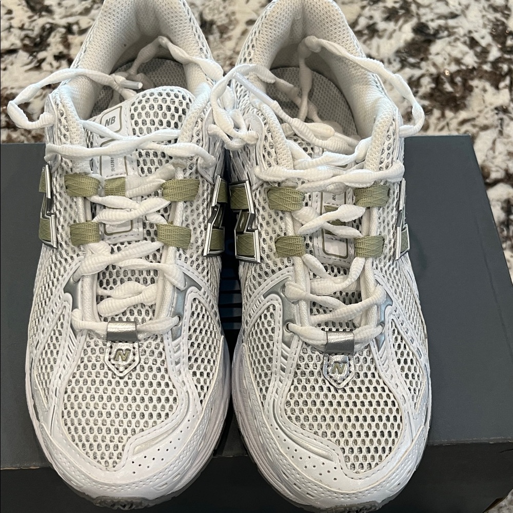 New Balance Women's White with grey and moss green accents.